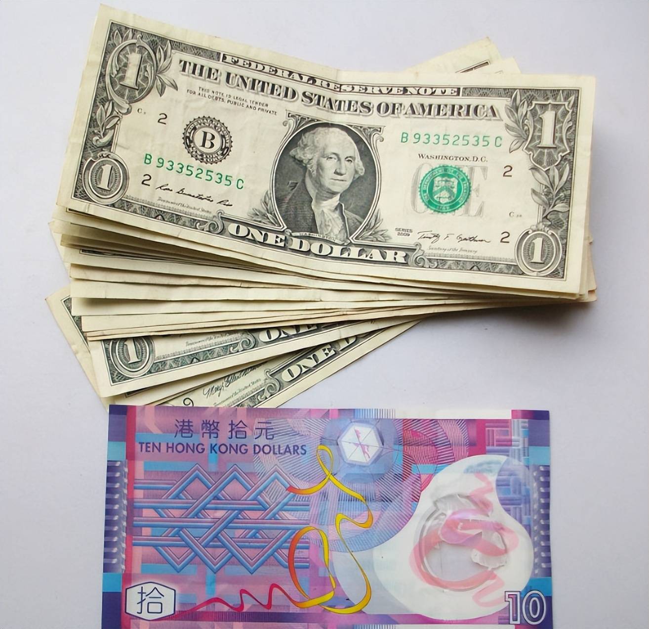 原创            香港明明是中国的领土，为什么用的是港币？不能强制用人民币吗？